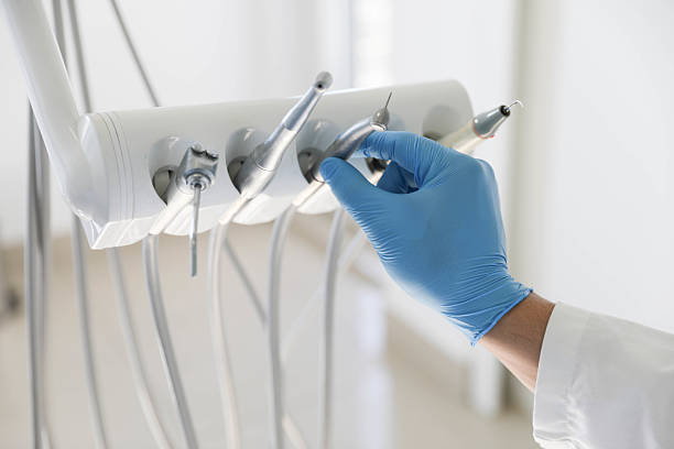 Professional Tooth Extraction technician working in Manchester, IA